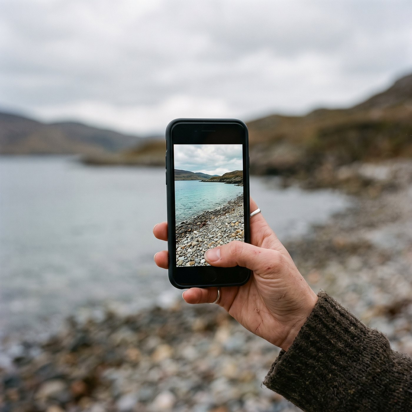 A phone showing a clean shoreline